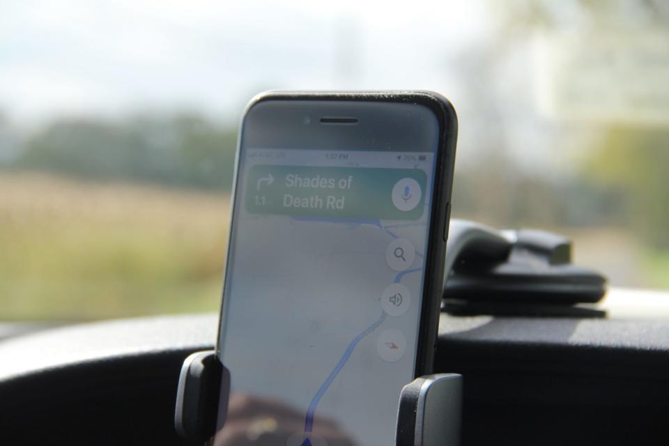 A phone GPS navigating in a car.