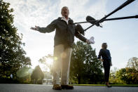 <p>President Donald Trump, accompanied by first lady Melania Trump, speaks to reporters as he walks to board Marine One on the South Lawn of the White House in Washington, Tuesday, Oct. 3, 2017, for a short trip to Andrews Air Force Base, Md. and then on to Puerto Rico. (Photo: Andrew Harnik/AP) </p>