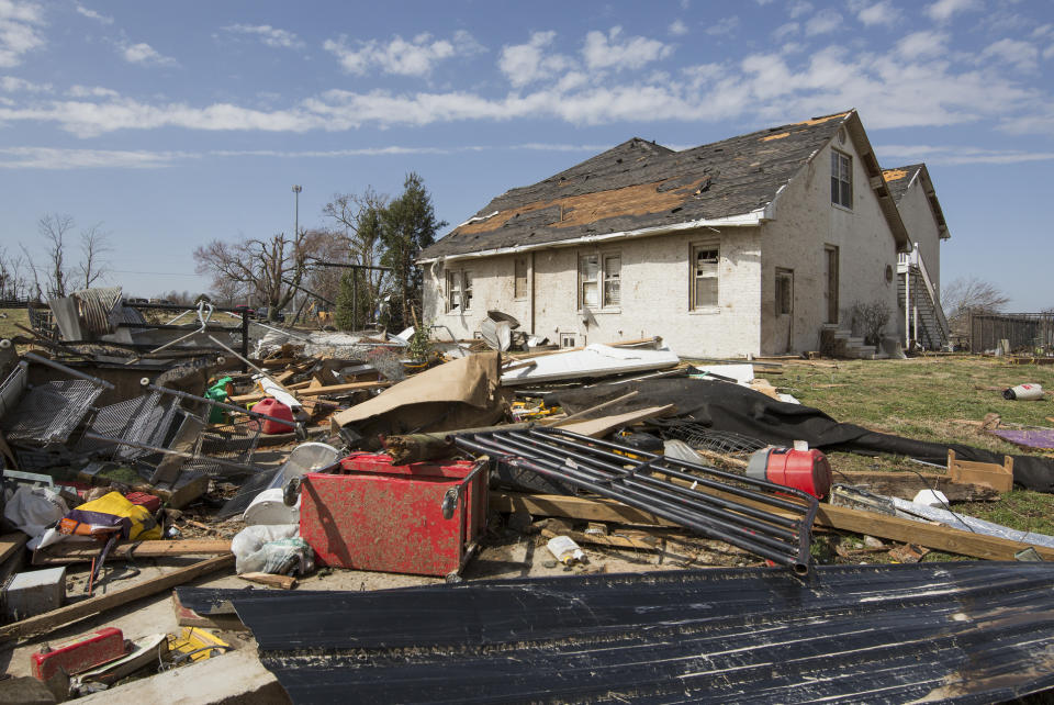 Debris scatters the ground after a tornado touched down in McCracken County, Kentucky on Thursday, March 14, 2019. (Ellen O'Nan/The Paducah Sun via AP)