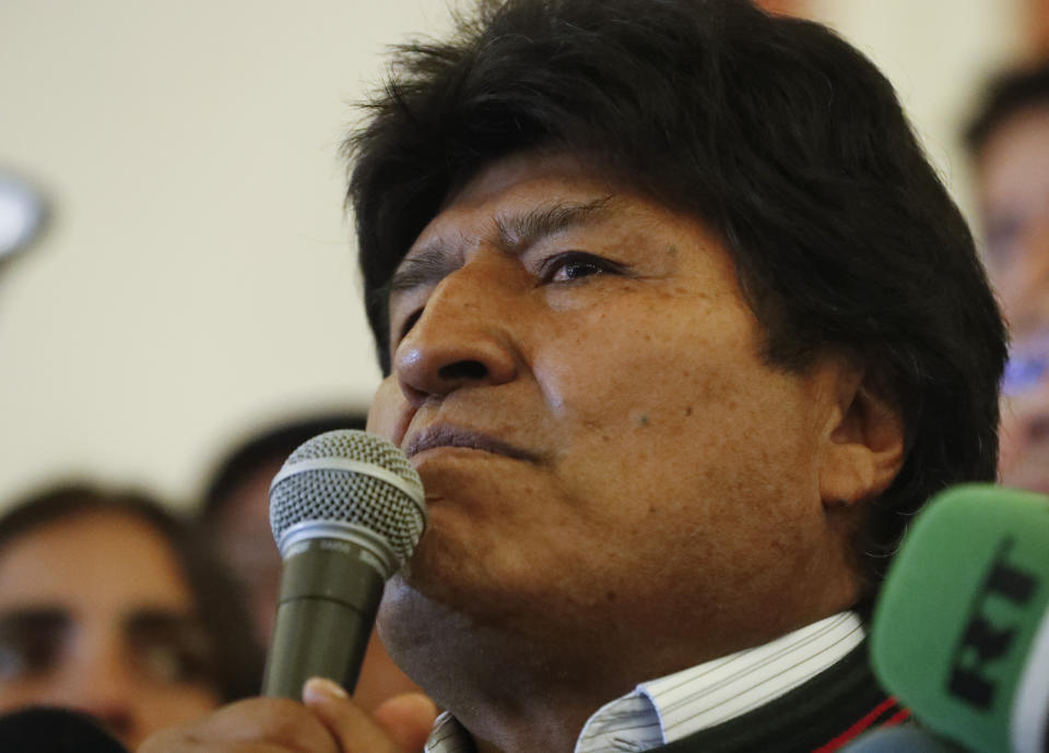 Bolivian President Evo Morales speaks to supporters at the presidential palace in La Paz, Bolivia, after a first round presidential election, Sunday, Oct. 20, 2019. Morales led in early returns from the first round of Sunday’s presidential election, but he appeared headed to a runoff in the tightest political race of his life. (AP Photo/Jorge Saenz)