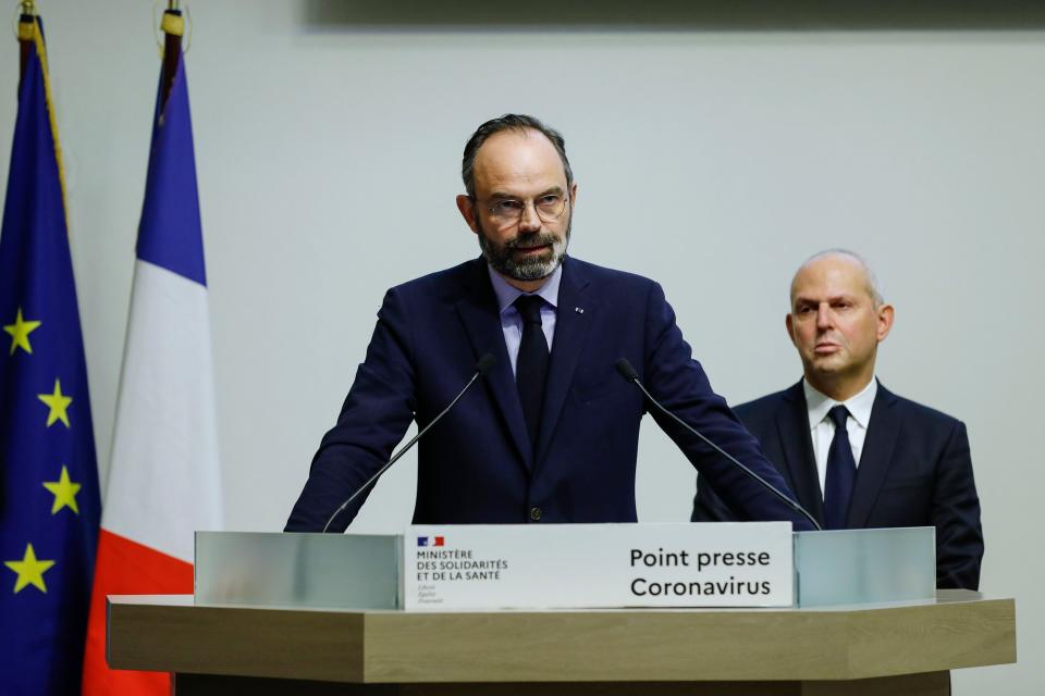 French Prime Minister Edouard Philippe speaks, flanked by French Director General of Health Jerome Salomon, as he announces new measures to limit the spread of COVID-19, on March 14, 2020, in Paris. (Photo: THOMAS SAMSON via Getty Images)