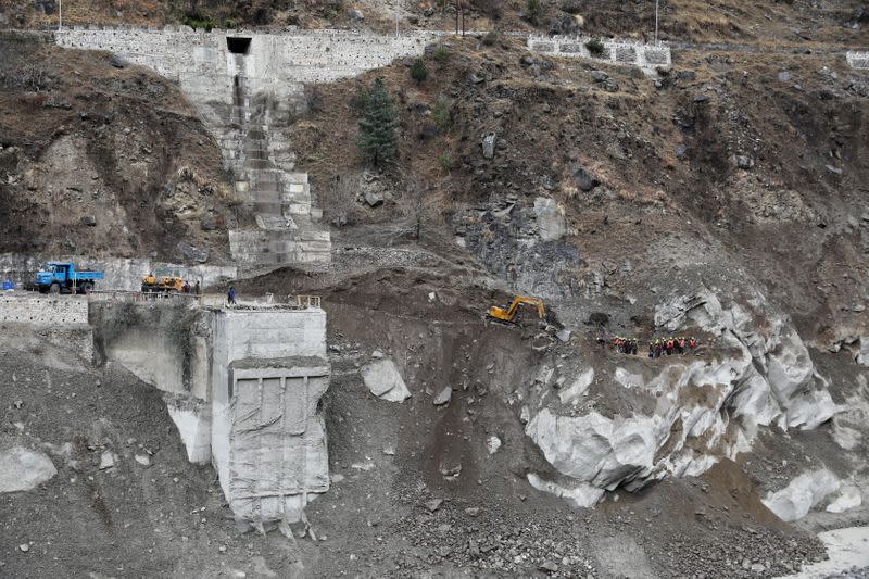 Rescue operation after a part of a glacier broke away, in Raini village