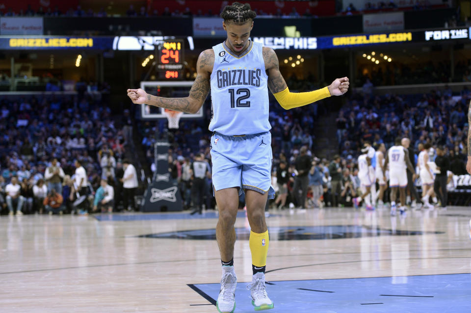 Memphis Grizzlies guard Ja Morant dances on the court in the second half of the team's NBA basketball game against the Oklahoma City Thunder on Wednesday, Dec. 7, 2022, in Memphis, Tenn. (AP Photo/Brandon Dill)