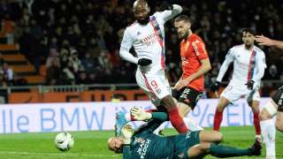 Lyon's French forward Moussa Dembele scores a goal during the French L1 football match between FC Lorient and Olympic Lyonnais at the Moustoir Stadium in Lorient, western France, on March 4, 2022. (Photo by Loic VENANCE / AFP)