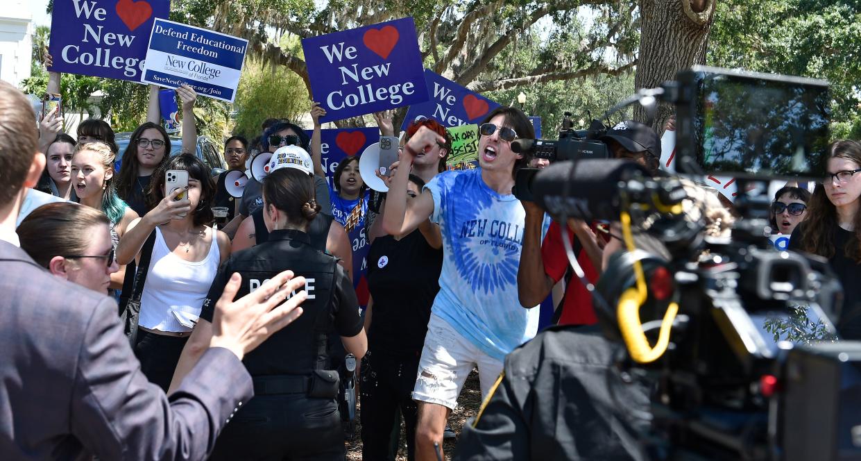 New College of Florida Board Trustee Christopher Rufo is greeted by protesters during a May 2023 confrontation that occurred after Gov. Ron DeSantis held a bill signing ceremony on the campus.