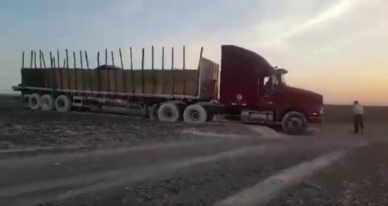 A tractor-trailer is seen parked on the site of Peru's famous Nazca Lines on Saturday after the driver took his vehicle off the road. (Photo: Facebook)