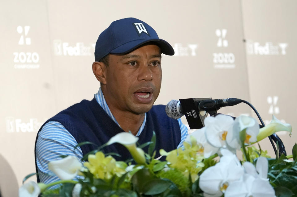 Tiger Woods of the United States answers a reporter's question during a news conference ahead of the Challenge: Japan Skins event at Accordia Golf Narashino C.C. in Inzai, Japan, Monday, Oct. 21, 2019. Tiger Woods will play at the Zozo Championship PGA Tour which will be held at Oct. 24-27. (AP Photo/Lee Jin-man)