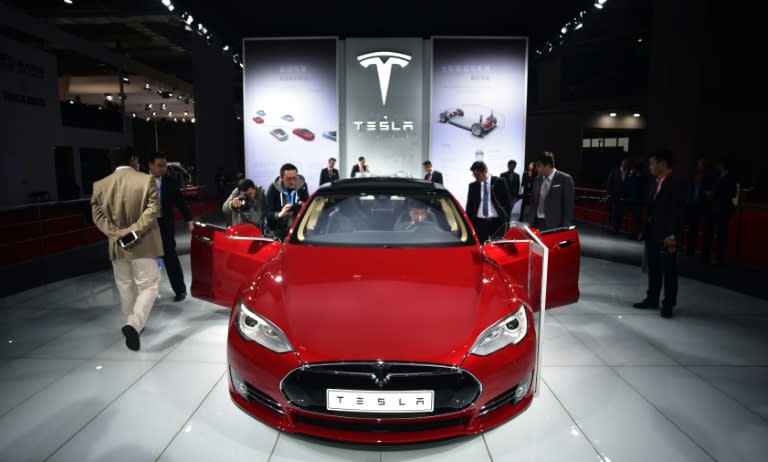 A Tesla Model S P85d on display at the 2015 Shanghai auto show. Electric vehicle sales have been government-subsidised partly to help reduce China's notorious air pollution, and the Chinese market is now the world's biggest and growing quickly