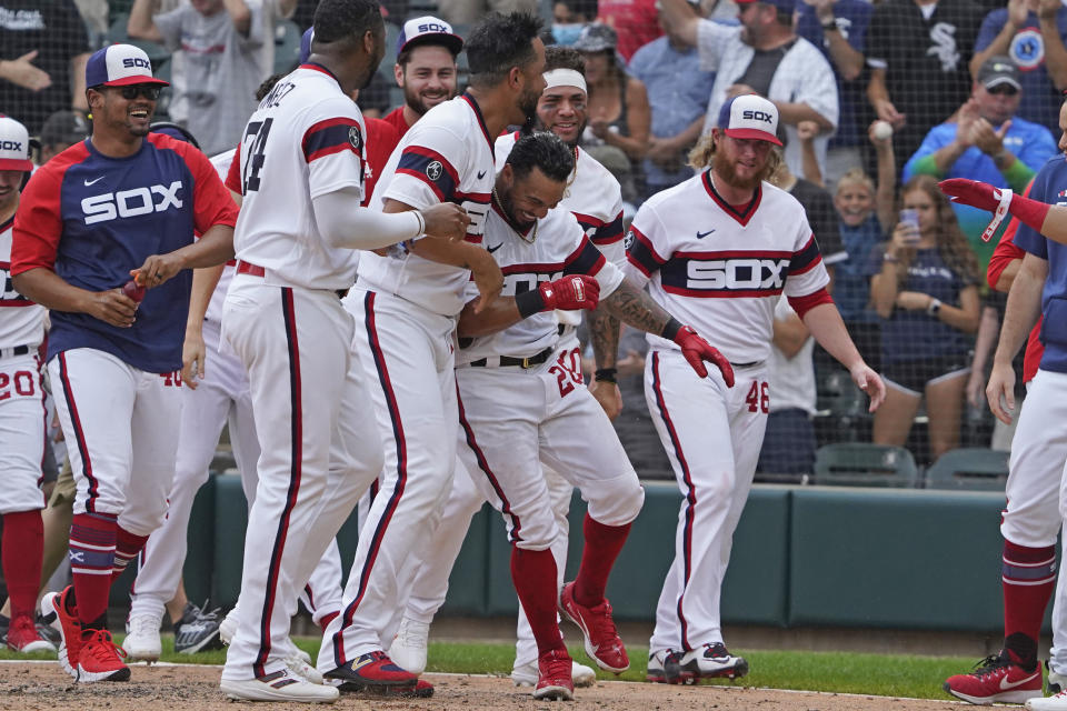 Chicago White Sox's Leury Garcia (28) celebrates his walk-off home run during the ninth inning against the Boston Red Sox of a baseball game, Sunday, Sept. 12, 2021, in Chicago. (AP Photo/David Banks)