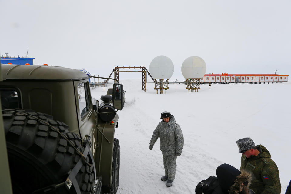 Soldiers stand at a radar facility on the Alexandra Land island near Nagurskoye, Russia, Monday, May 17, 2021. Once a desolate home mostly to polar bears, Russia's northernmost military outpost is bristling with missiles and radar and its extended runway can handle all types of aircraft, including nuclear-capable strategic bombers, projecting Moscow's power and influence across the Arctic amid intensifying international competition for the region's vast resources. (AP Photo/Alexander Zemlianichenko)