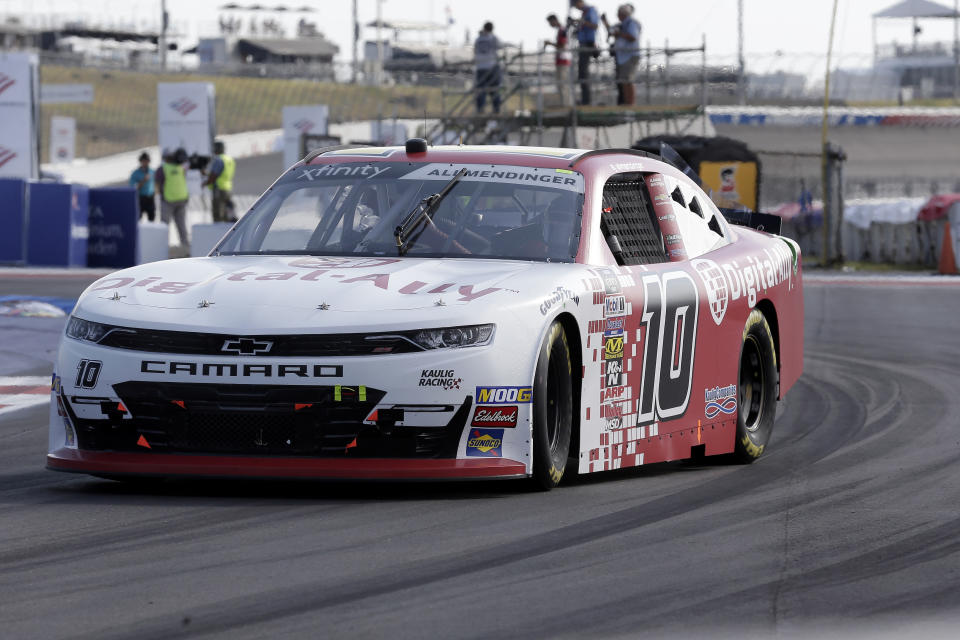 AJ Allmendinger (10) drives through Turn 12 during the NASCAR Xfinity Series auto race at Charlotte Motor Speedway in Concord, N.C., Saturday, Sept. 28, 2019. (AP Photo/Gerry Broome)