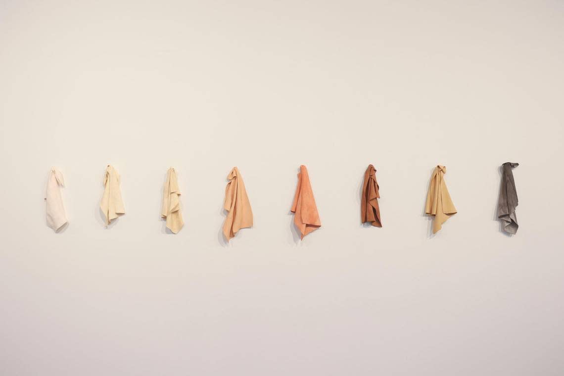 ‘Auburn, Colored China Rags’ by Juana Valdés hang on the wall at Espacio 23. The rags are made from bone china. The material is typically associated with the wealthy. “However, this work hints on how people of all different skin tones and all types of individuals are involved with the material - whether they’re eating from it or serving it,” said one of the curators.