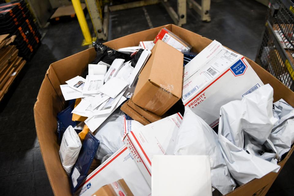 The USPS handles parcels during an influx for the holiday season on Thursday, Dec. 5, 2019 at the Processing and Distribution Center in Sioux Falls. The postal service will sort through millions of pieces of mail before the holidays end. 