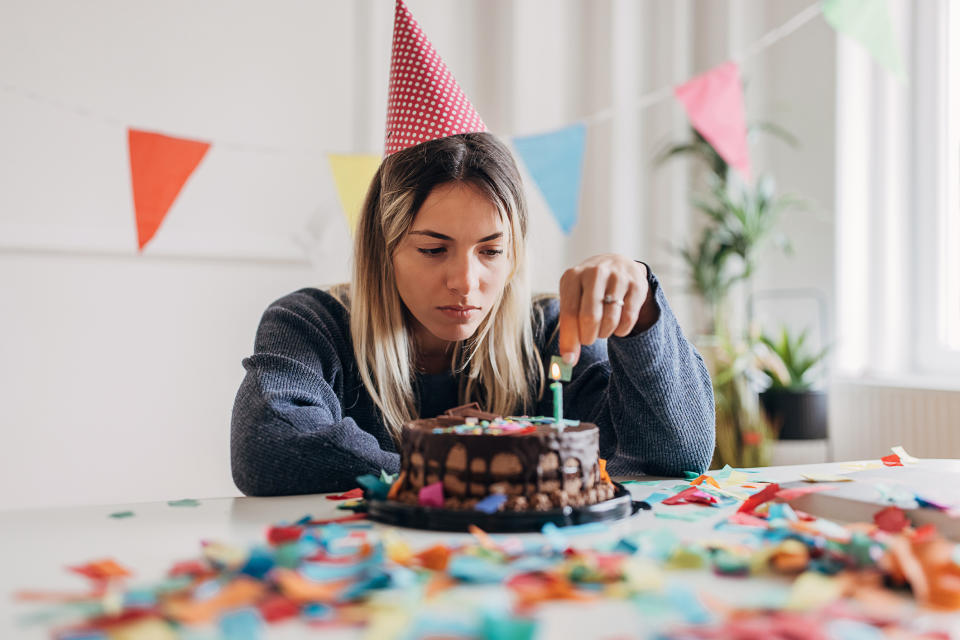 A woman looking sad on her birthday