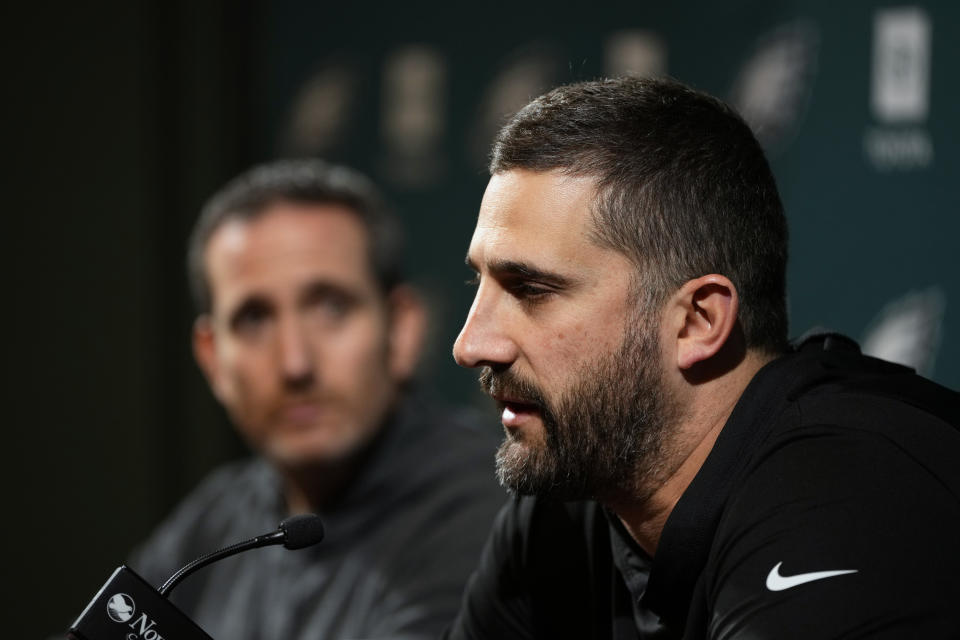 Philadelphia Eagles' Nick Sirianni, right, speaks during a news conference with Howie Roseman at the NFL teams' practice facility, Wednesday, Jan. 24, 2024, in Philadelphia. (AP Photo/Matt Slocum)