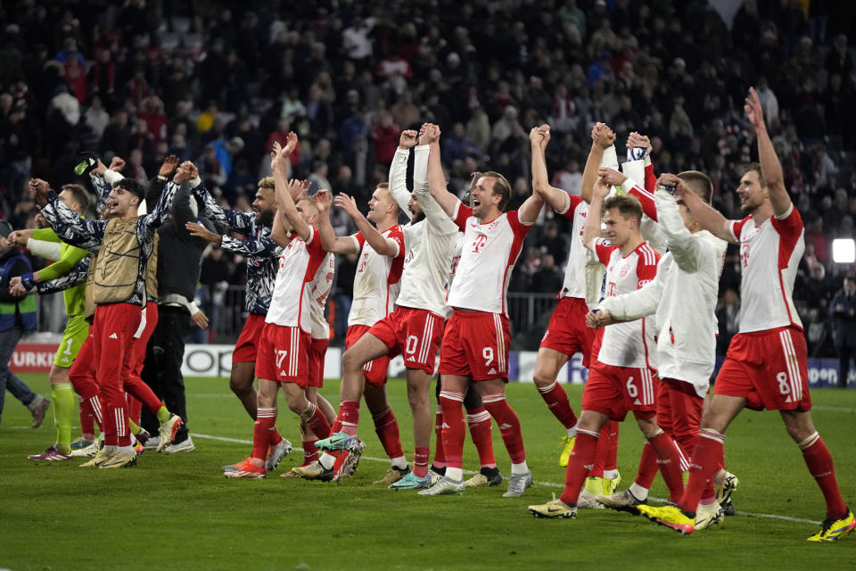 Bayern's players celebrate after the Champions League quarter final second leg soccer match between Bayern Munich and Arsenal at the Allianz Arena in Munich, Germany, Wednesday, April 17, 2024. (AP Photo/Matthias Schrader)