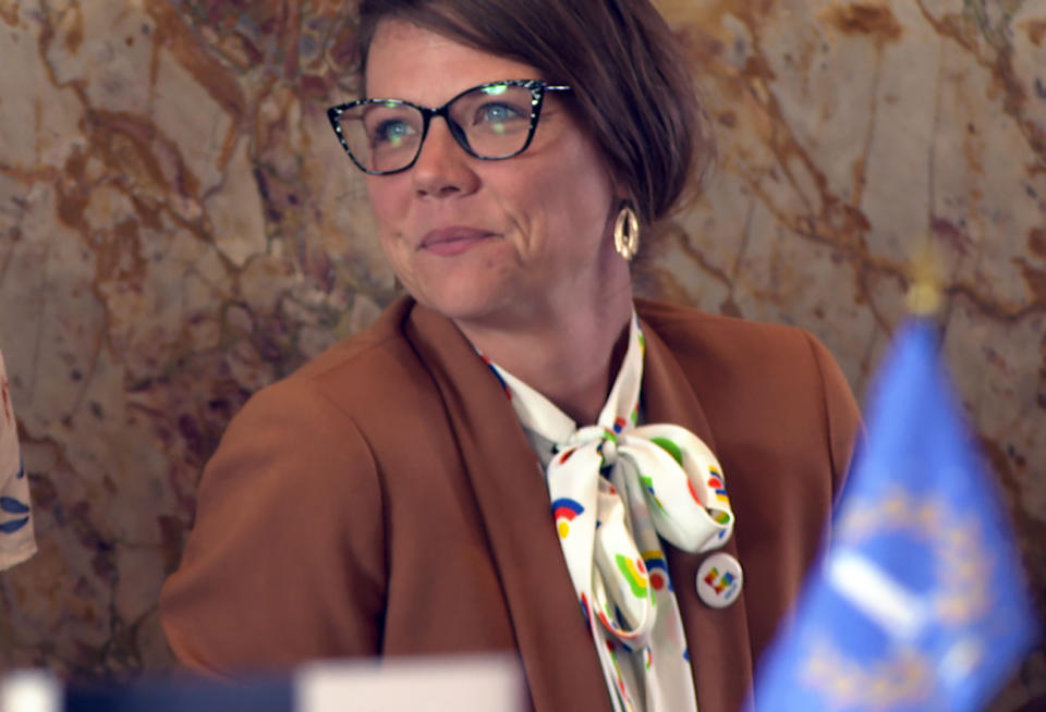 SarahJane Guidry, executive director of Forum for Equality, sits in the Louisiana House chamber in Baton Rouge, La., on Tuesday, April 16, 2024. Guidry, an LGBTQ+ advocate, has testified in opposition to proposed bills in Louisiana that target transgender people. (AP Photo/Stephen Smith)