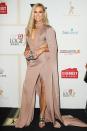 <p>Sonia Kruger slayed on the red carpet in this blush pink dress with an epic cape detail from designer Balmain.</p>