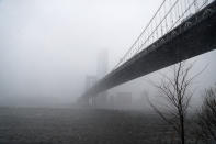 <p>A view of the Manhattan Bridge from the DUMBO section of Brooklyn, New York as a spring storm hit the area on March 21, 2018. (Photo: Gordon Donovan/Yahoo News) </p>