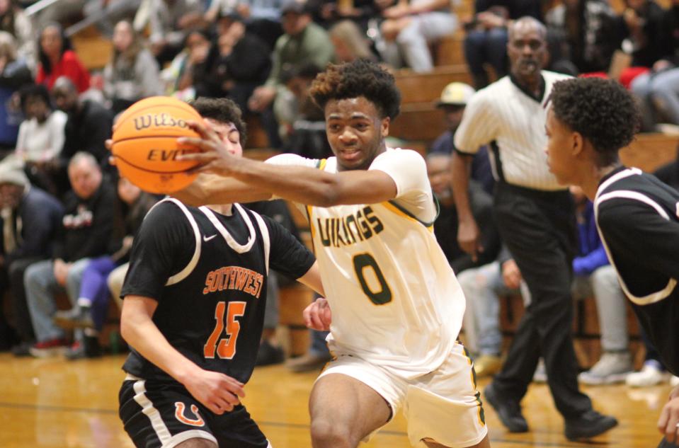 White Oak's CJ Jackson goes up for a layup against Southwest on Wednesday.