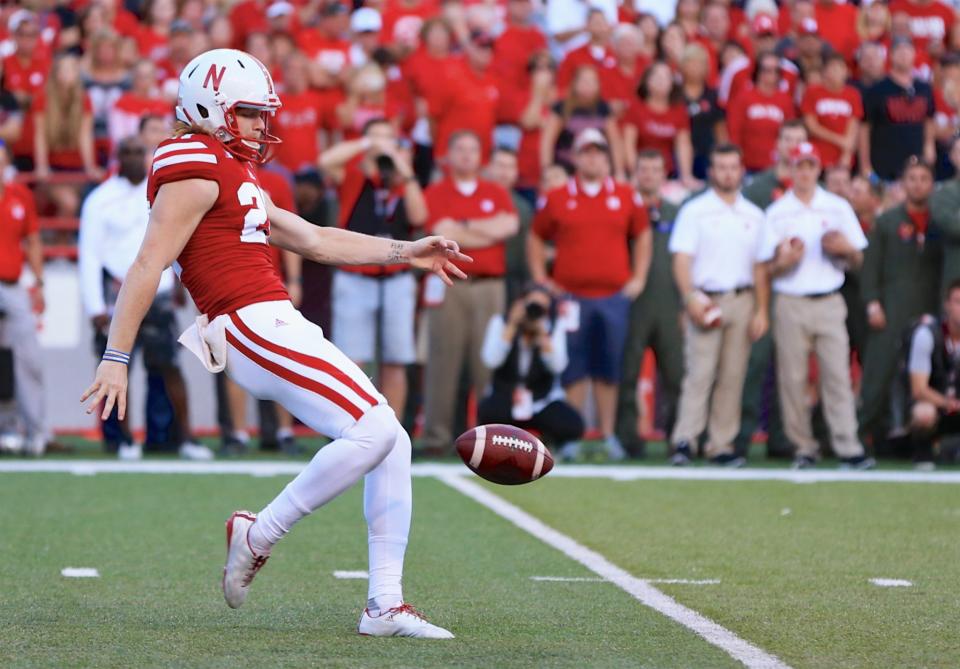 Sam Foltz (27) led the Big Ten with an average of 44.2 yards per punt in 2015. He died in July. (AP Photo/Nati Harnik)