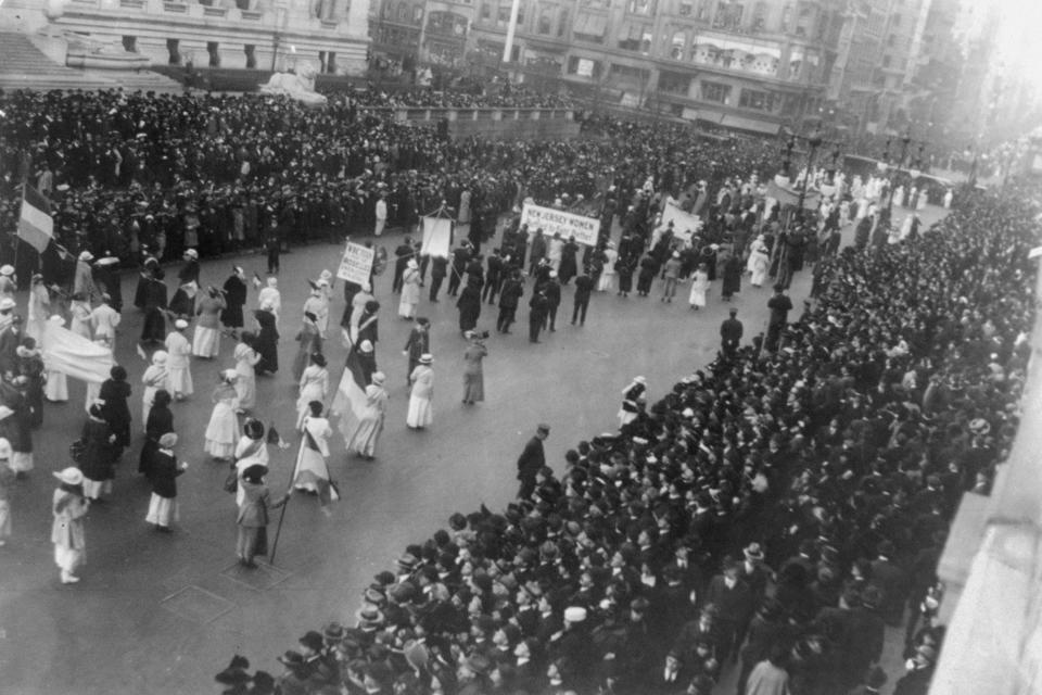 In this Oct. 23, 1915 photo made available by the Library of Congress, women march in a suffrage parade on Fifth Avenue in New York. (Library of Congress via AP)