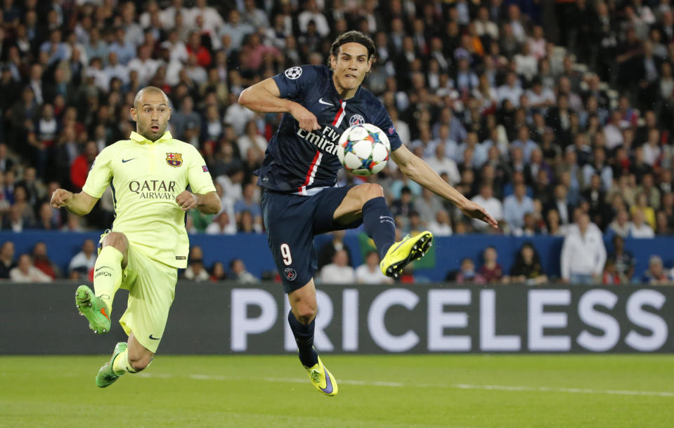 Football - Paris St Germain v FC Barcelona - UEFA Champions League Quarter Final First Leg - Parc des Princes, Paris, France - 15/4/15 PSG's Edinson Cavani in action with Barcelona's Javier Mascherano Reuters / Christian Hartmann