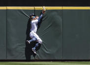 Seattle Mariners centerfielder Jake Fraley hits the wall after catching a ball by Tampa Bay Rays' Ji-Man Choi for an out during the fourth inning of a baseball game, Sunday, June 20, 2021, in Seattle. (AP Photo/Stephen Brashear)