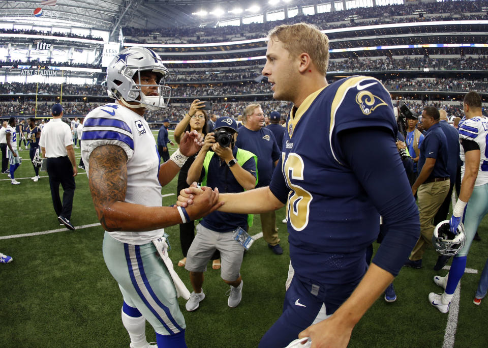 Cowboys quarterback Dak Prescott, left, and Rams quarterback Jared Goff have each benefitted from their situation. (AP Photo/Ron Jenkins)