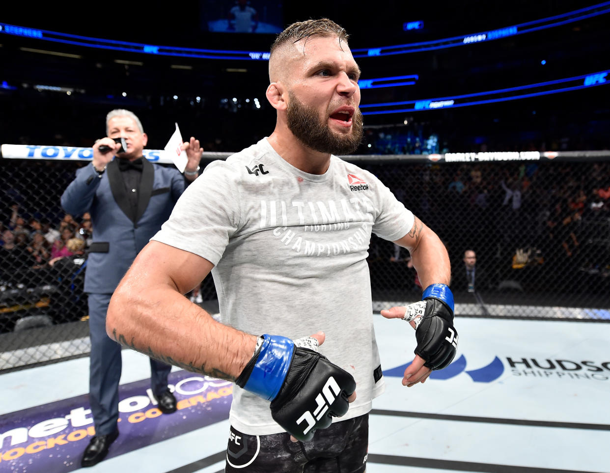 Featherweight Jeremy Stephens gestures to the crowd in Orlando, Florida, on Saturday that he wants a title shot after knocking out Josh Emmett in the second round. (Getty Images)