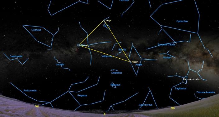 July 22, 2023 at 9:30 pm - The Summer Triangle, Vega, Altair and Deneb, form a triangle in the starry night sky, surrounded by outlined constellations