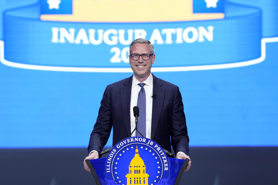 Illinois Treasurer Michael Frerichs smiles as he addresses the crowd after taking the oath of office during ceremonies Monday, Jan. 9, 2023, in Springfield, Ill. (AP Photo/Charles Rex Arbogast)