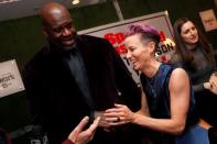 U.S. soccer player Megan Rapinoe and Shaquille O'Neal arrive for Sports Illustrated Sportsperson of the Year Awards in New York