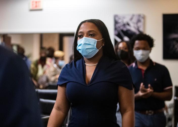 Katrina Robinson walks into a press conference following her conviction on wire fraud charges on Thursday, Sept. 30, 2021, in Memphis, Tenn.