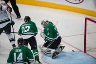 Apr 22, 2016; Dallas, TX, USA; Dallas Stars goalie Antti Niemi (31) gives up the game wining goal to Minnesota Wild center Mikko Koivu (9) during the overtime period in game five of the first round of the 2016 Stanley Cup Playoffs at the American Airlines Center. Mandatory Credit: Jerome Miron-USA TODAY Sports