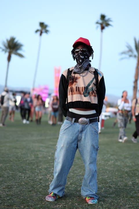 INDIO, CALIFORNIA – APRIL 14: (FOR EDITORIAL USE ONLY) A festivalgoer attends the 2024 Coachella Valley Music and Arts Festival at Empire Polo Club on April 14, 2024 in Indio, California. (Photo by Monica Schipper/Getty Images for Coachella)