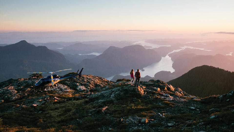 Guests take in sunset views from Mount Stevens after a short helicopter ride. - Credit: Jeremy Kopeks