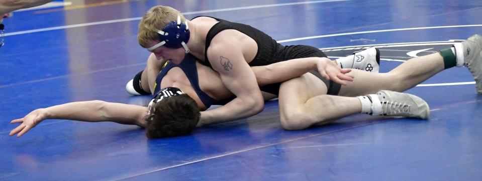 Claiming the pin at 175 pounds and solidifying the Springboro team win in the finals at the OHSWCA Division I district duals-upper bracket is Matt Kowalski, Feb. 4, 2023.