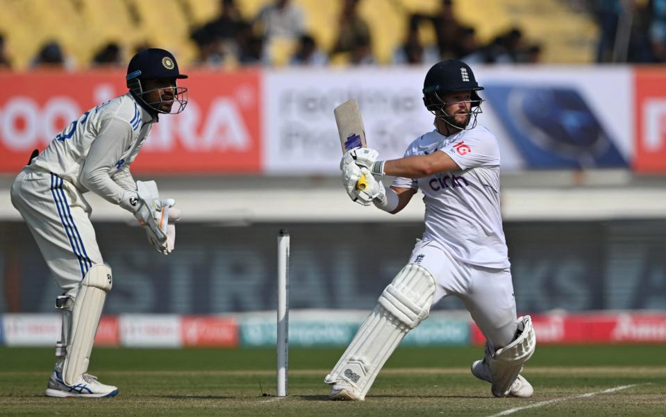 England's Ben Duckett (R) plays a shot during the second day of the third Test cricket match between India and England at Niranjan Shah stadium in Rajkot on February 16, 2024.
