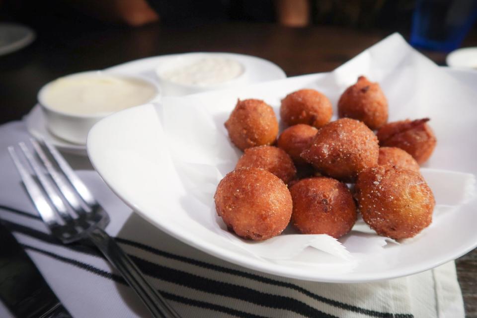 A batch of fresh hush puppies at The Regional restaurant in West Palm Beach.