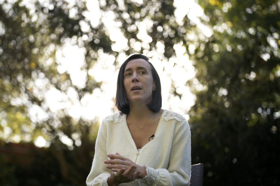 Ophelie Toulliou, sister of a victim of the Rio-Paris plane crash, speaks during an interview with The Associated Press in Sannois, outside Paris, Friday, Oct. 7, 2022. It was the worst plane crash in Air France history, killing people of 33 nationalities and having lasting impact. It led to changes in air safety regulations, how pilots are trained and the use of airspeed sensors. (AP Photo/Christophe Ena)