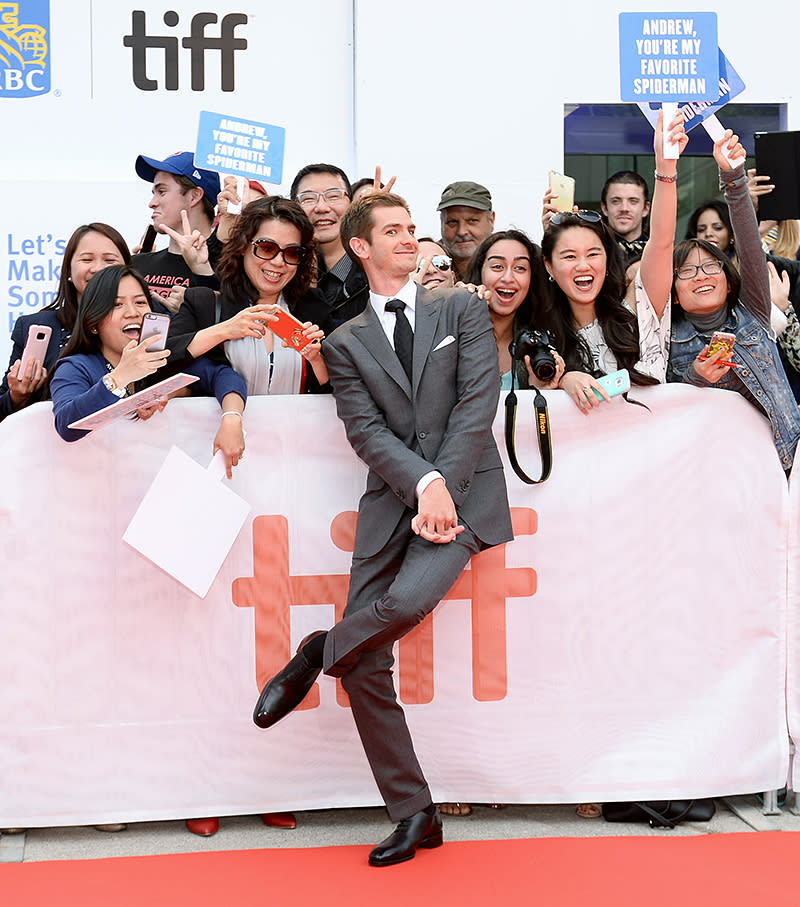 <p>Can you tell that these fans were excited to see Spider-Man in the flesh? Actually, the actor appeared at the Toronto International Film Festival for the premiere of his upcoming romantic drama, <i>Breathe</i>, but they didn’t let that get in the way of their happiness. (Photo: Tara Ziemba/WireImage) </p>
