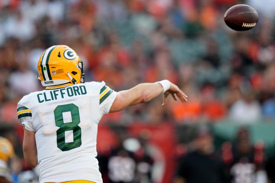 Green Bay Packers quarterback <a class="link " href="https://sports.yahoo.com/nfl/players/40173" data-i13n="sec:content-canvas;subsec:anchor_text;elm:context_link" data-ylk="slk:Sean Clifford;sec:content-canvas;subsec:anchor_text;elm:context_link;itc:0">Sean Clifford</a> (8) throws in the second quarter during a Week 1 NFL preseason game between the Green Bay Packers and the Cincinnati Bengals,Friday, Aug. 11, 2023, at Paycor Stadium in Cincinnati.