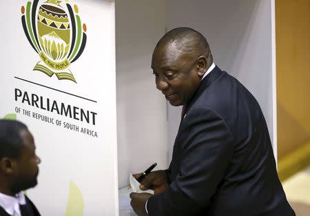 President Cyril Ramaphosa casts his vote for the Speaker of the National Assembly at the parliament in Cape Town, South Africa, May 22, 2019. REUTERS/Sumaya Hisham