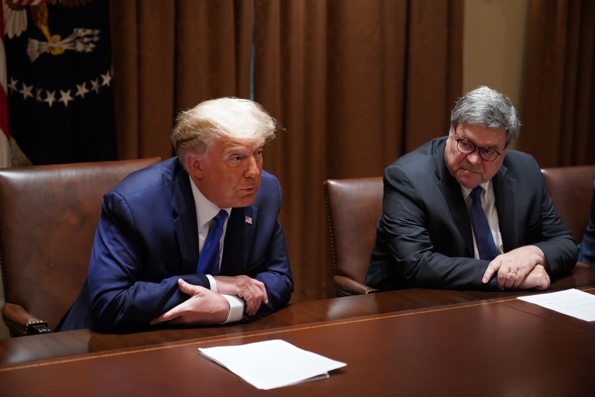 Donald Trump with Bill Barr in the Cabinet Room of the White House in 2020 (AFP via Getty Images)
