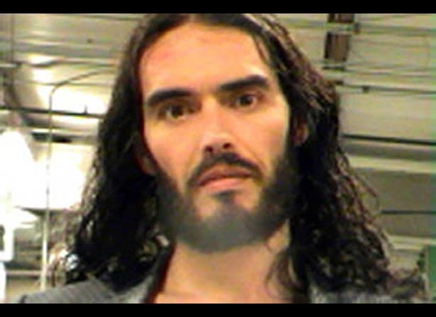 Russell Brand was arrested on March 15 after allegedly throwing and smashing a photographer's iPhone in New Orleans. (New Orleans Parish Sheriff's Office)