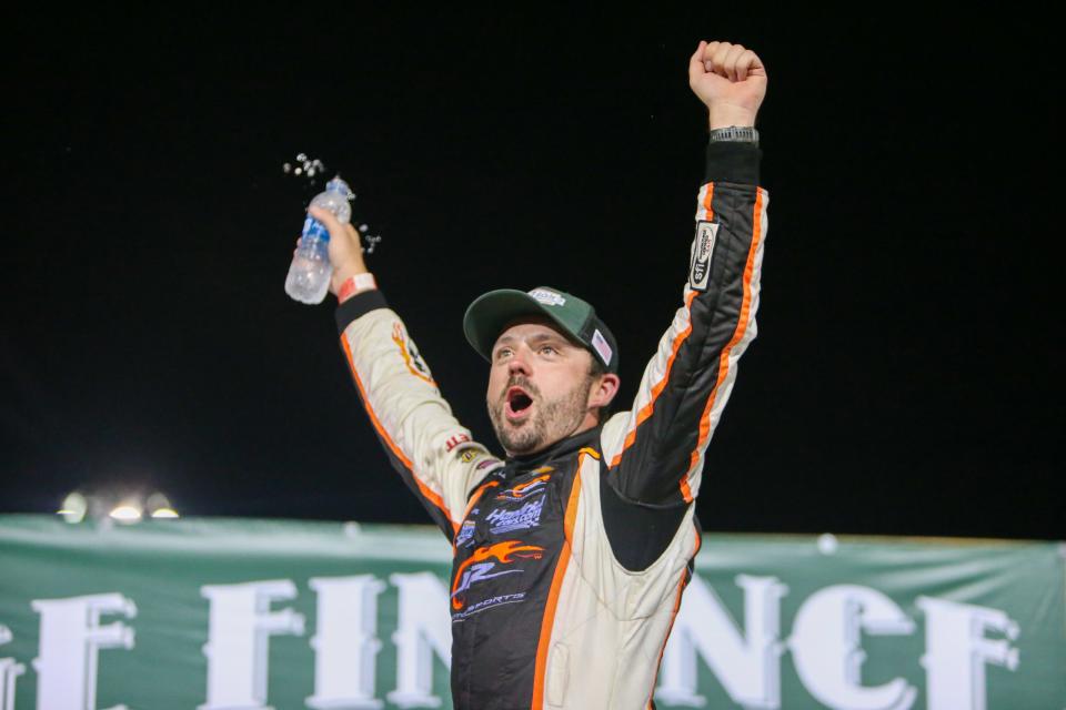 Josh Berry celebrates in Victory Lane after winning the Late Model Stock portion of the Jack Ingram Memorial at North Carolina\