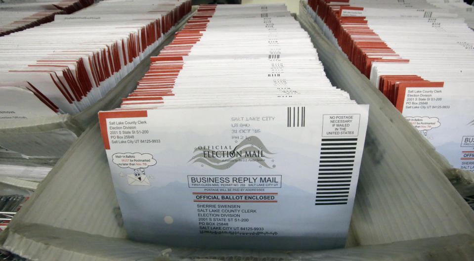 FILE - In this Nov. 1, 2016, file photo, mail-in ballots for the 2016 General Election are shown at the elections ballot center at the Salt Lake County Government Center, in Salt Lake City. As President Donald Trump rails against voting by mail, many members of his own political party are embracing it to keep their voters safe during the coronavirus outbreak. (AP Photo/Rick Bowmer, File)