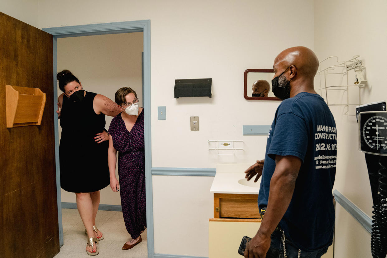 OB/GYN Diane Horvath (L) and Certified Nurse-Midwife Morgan Nuzzo, co-founders of Partners in Abortion Care, chat with contractor Reuben Pemberton about renovating an empty space where they plan to start their abortion clinic in College Park, MD, Tuesday, May 31, 2022. (Photo/Shuran Huang)