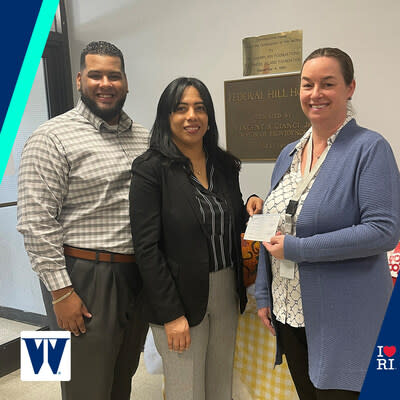 Team Members from Washington Trust's future Olneyville Branch Location present a $1,000 donation to Federal Hill House in support of the Olneyville Food Center's efforts to distribute food ahead of the Thanksgiving holiday. From L to R: Louis Arias, Flex Banker at Washington Trust’s Olneyville Branch; Enercida Abad De La Cruz, Assistant Branch Manager at Washington Trust’s Olneyville Branch; and Kimberly Fernandez, Executive Director at Federal Hill House.